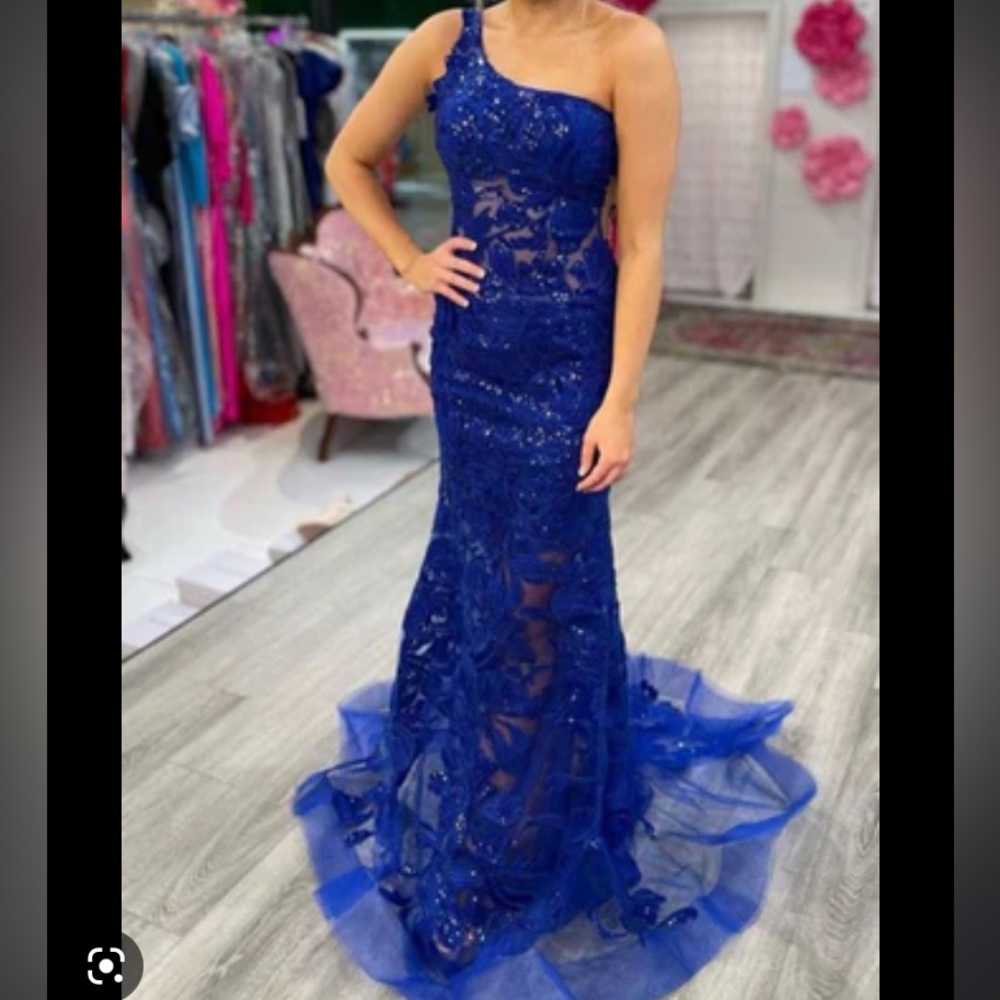 Gorgeous blue formal dress. Never worn, never altered.